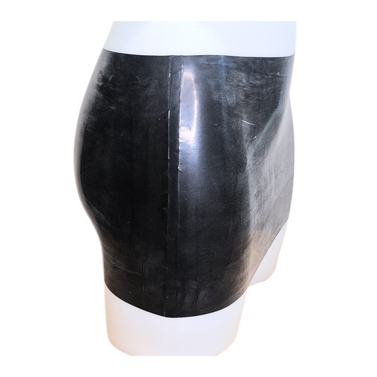 Side view of the black latex micro skirt