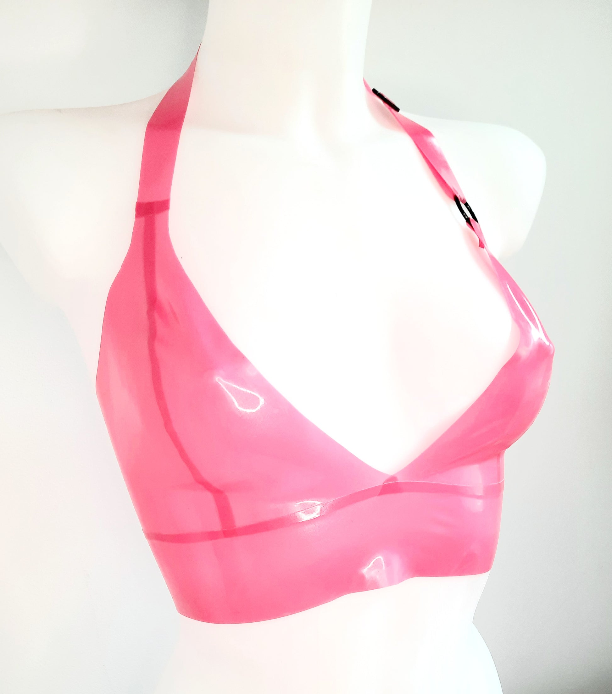Metallic fuchsia pink latex longline bra top with black O ring & slider.