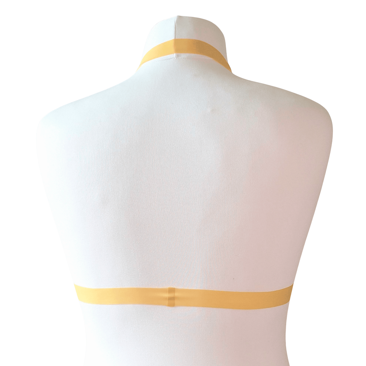 Back of A cute pearlsheen gold latex bikini bralette in size small - Small cups UK A/B with a 66cm band - stretches up to 75cm ish

Brand new sample, made for photo's

Non Wired, bikini style with halter neck strap