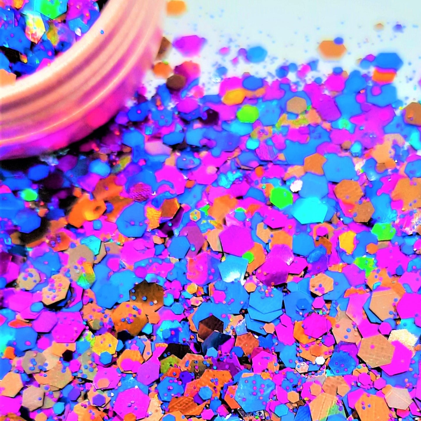 ea witch glitter mix  A perfect mix for any sea witch, especially those named Ursula!  Mainly Cadbury purples mixed in with a rainbow of greens, pinks & reds with a touch of blue.  A colourful collection of mixed sized glitter, super fine to chunky hexagons all in one bag, perfect for festival season, disco’s and just generally glittering up your look!